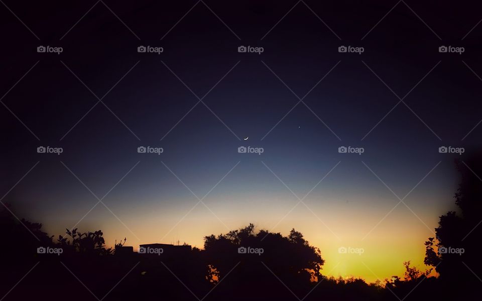 As the sun sets and the moon comes to view, you will also find Mars peeking through. 