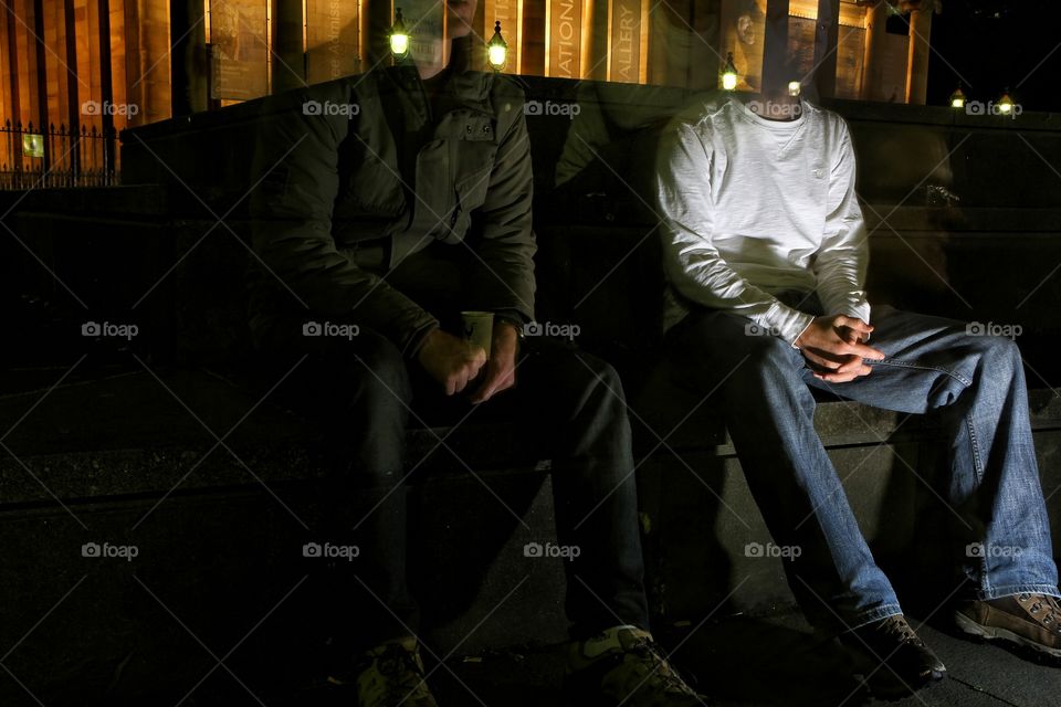 Long exposure with 2 men sitting on steps