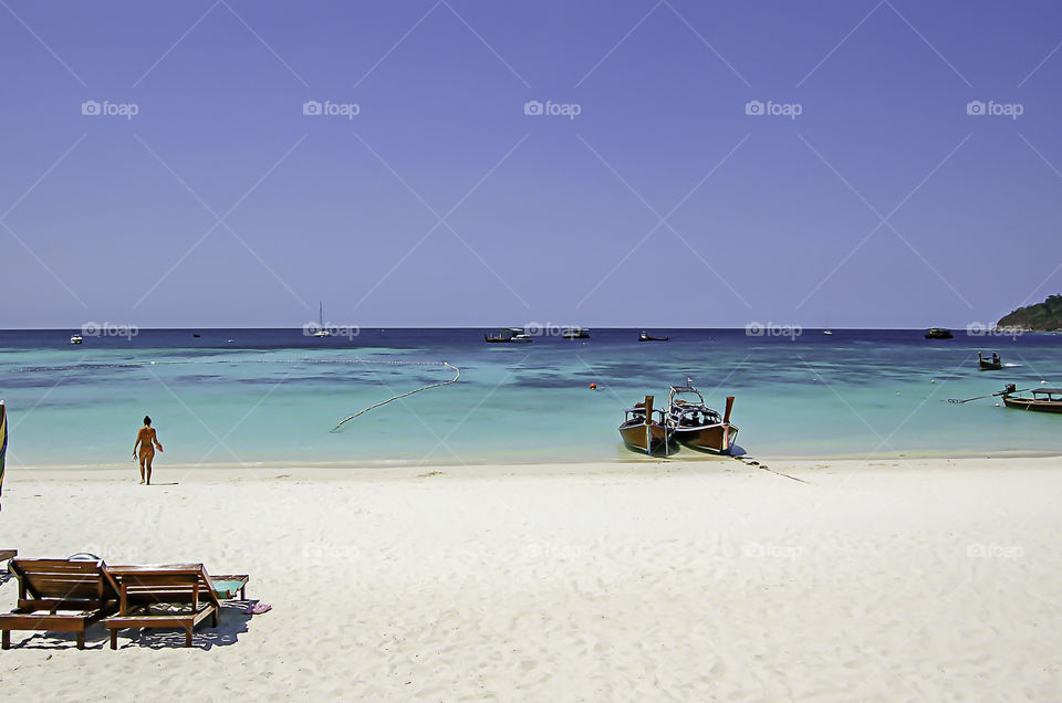 The beauty of the summer sea and the ship on the beach , Koh Lipe , Satun in Thailand.