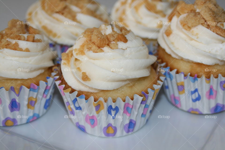 Cookie Crumble Cupcake . Homemade vanilla cupcakes with buttercream icing.  