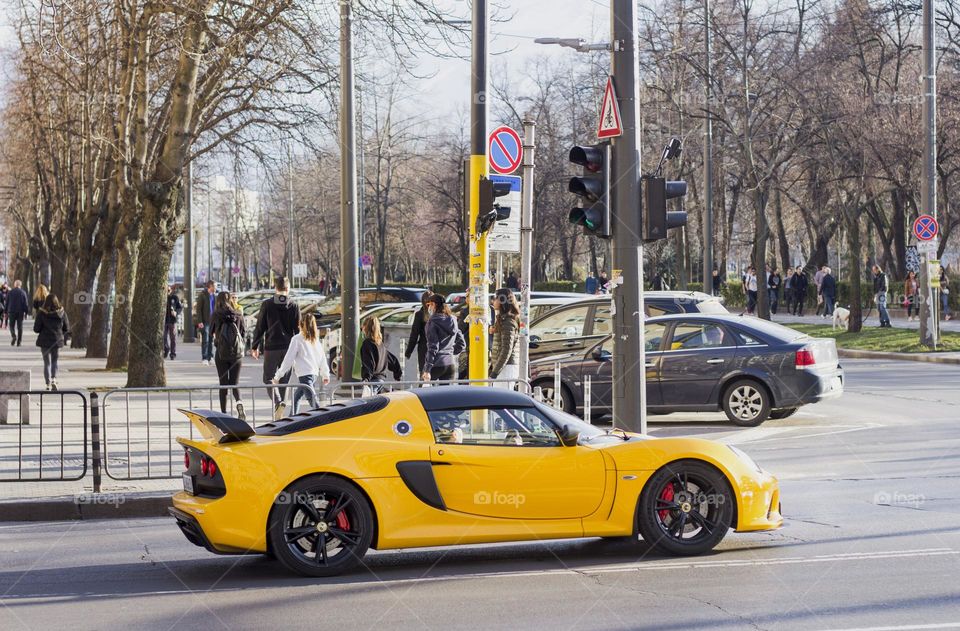 Yellow luxory car at the street