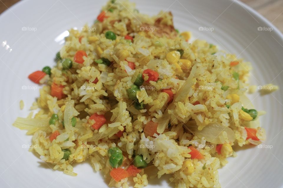 Easy recipe idea: curry taste stir fried rice( ingredients are mixed vegetable, curry powder, onion, rice, salt and pepper)