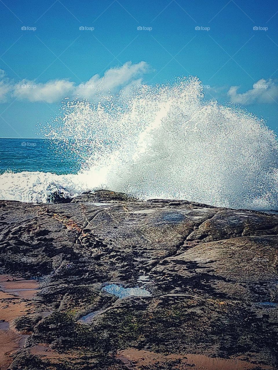 Nature demonstrates its strength and beauty.  The waves that crash against the rocks raise the waters in a natural spectacle.