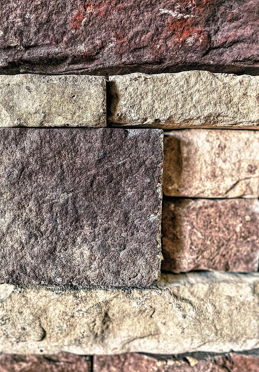 Geometry shapes around us, rectangles in a fireplace, rectangular shapes in brick work, rectangular shaped stones in a fireplace, up close stone patterns, stone patterns in fireplace, geometric shapes in everyday life 