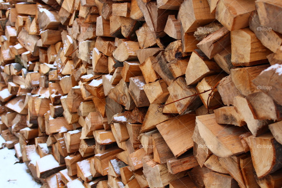 Wood pile with snow