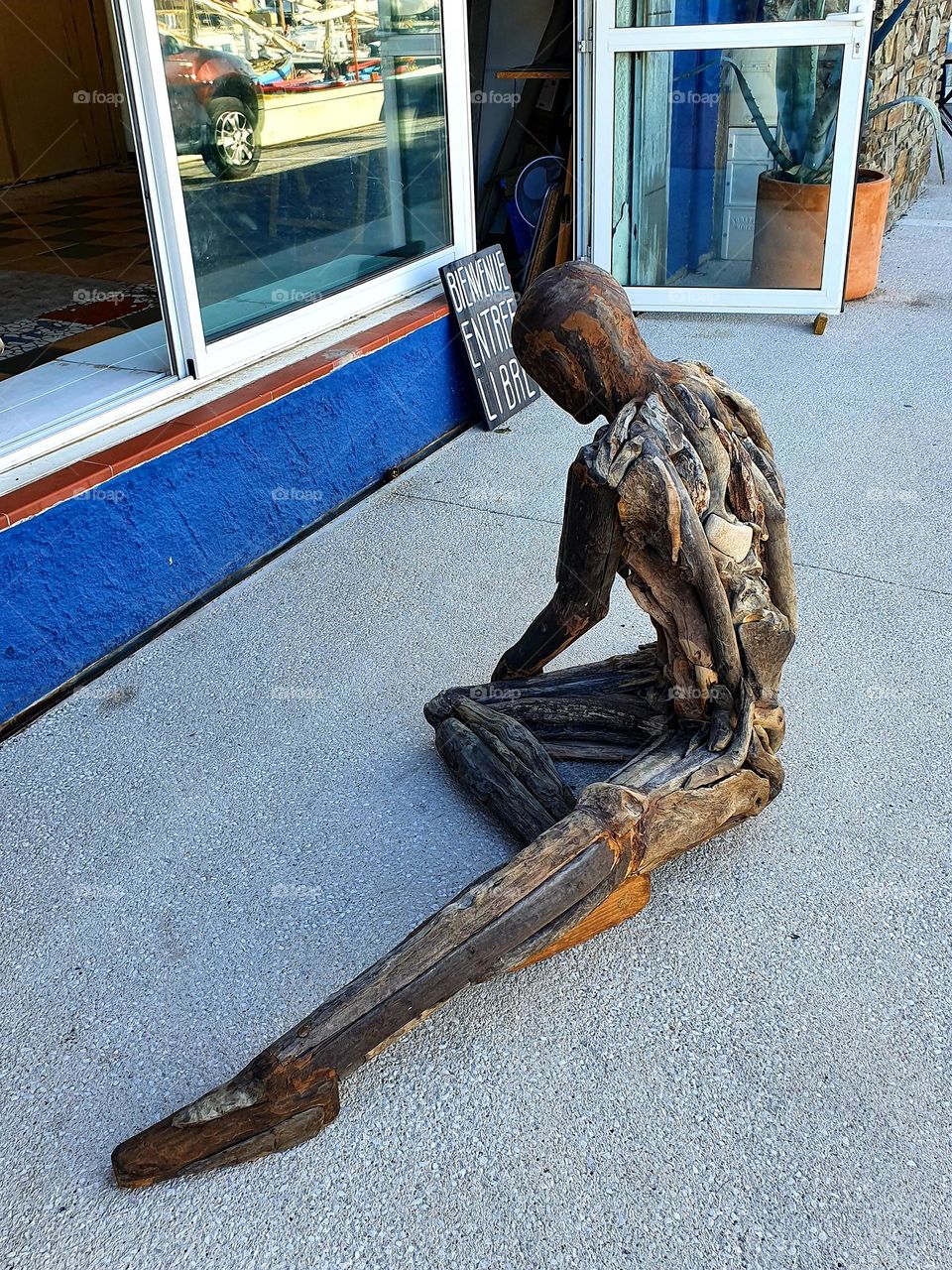 Driftwood sculpture of a man