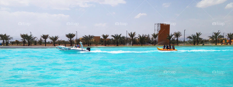 blue water lake boat by a.bilbaisi