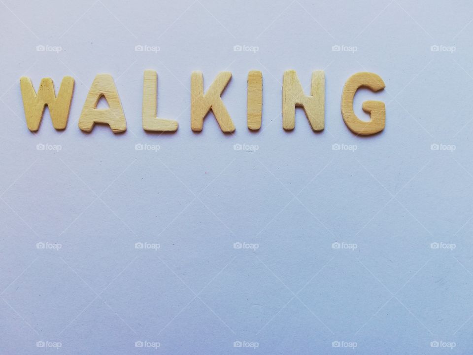 Written: "walking" on a white background