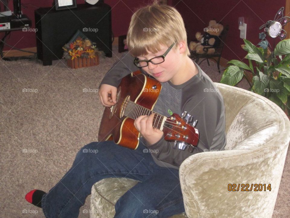 Playing guitar