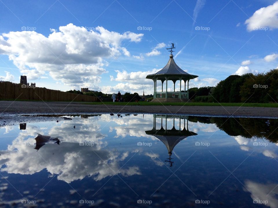Bandstand Blues. Walking along the riverbank I noticed the beautiful bandstand reflected in a puddle ....
