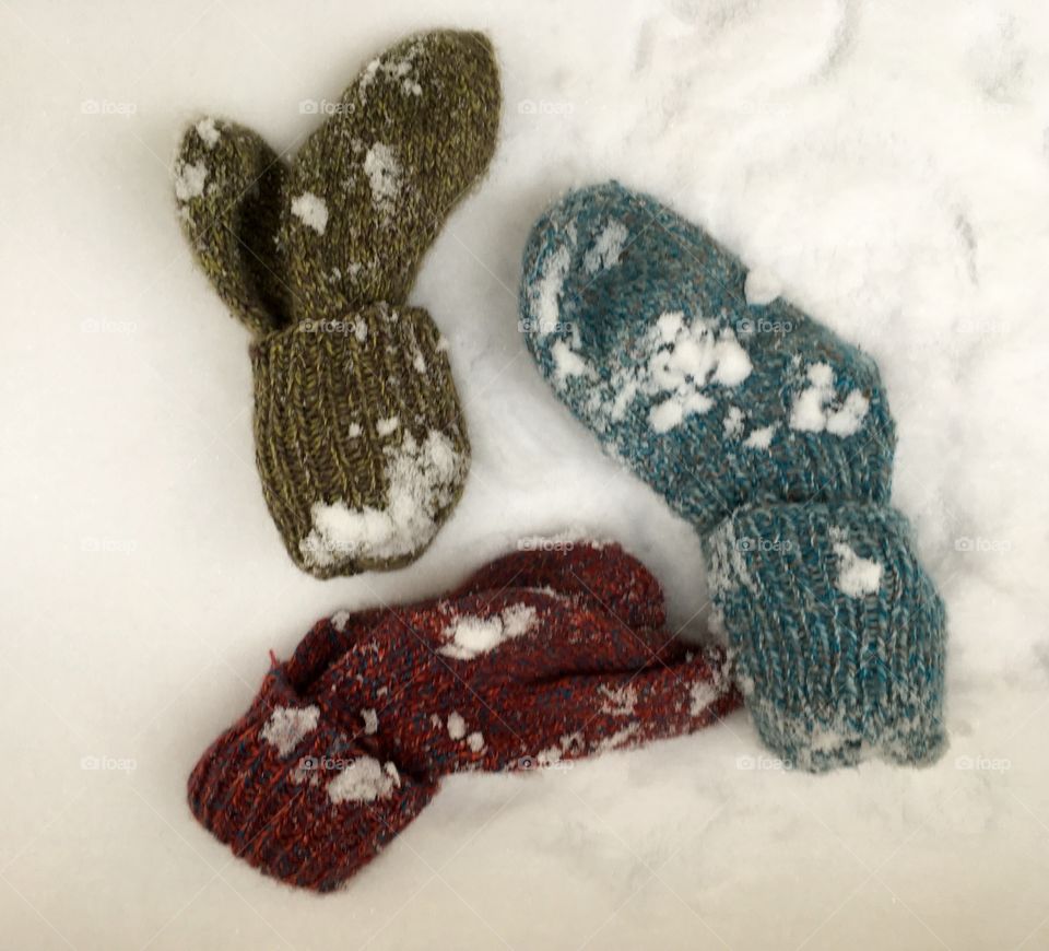 Three wool socks in snow