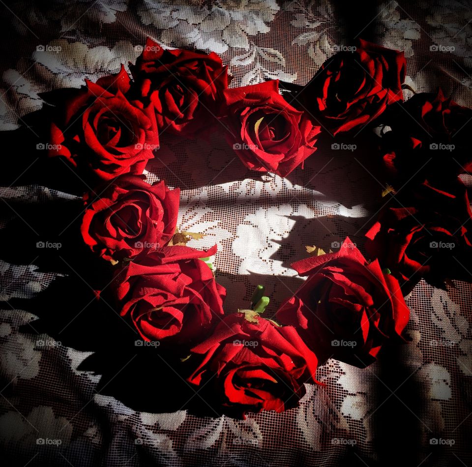 Heart shape made with rose flower