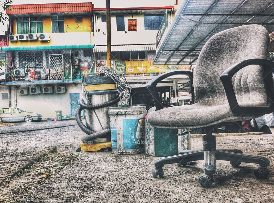 Waiting in carwash booth