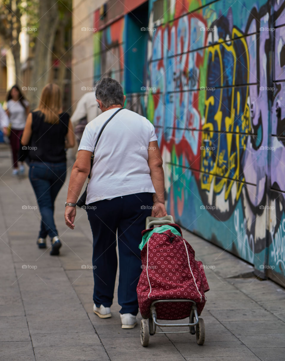 Elderly woman going shopping