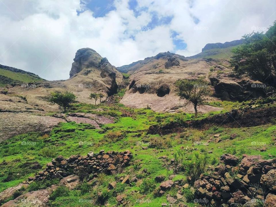Glory be to God, the magnificent and picturesque view and the natural green trees are a view that is nothing more wonderful than it