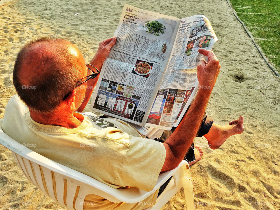 Man reading a newspaper