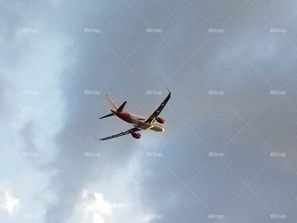 Beautiful airplane flying cross the sky