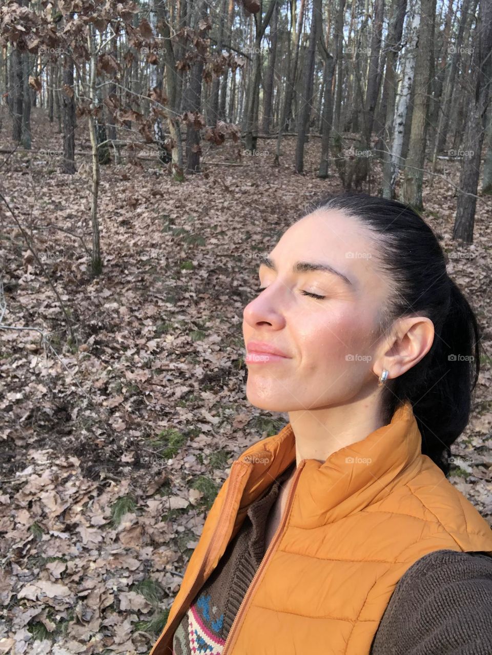 Woman relaxing in a forest 😌