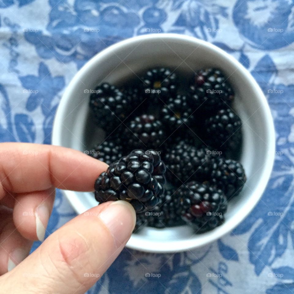 Holding a blackberry 