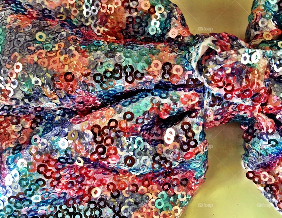 Pink and blue sequin fabric bow