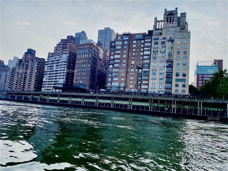This surreal looking impression of the “Upper East Side” of “Manhattan” was photographed when we were motoring our new sailboat from “Mamaroneck” to “Newtown Creek” by the “Pulaski Bridge” on July 1st of 2023. Hypnotic Productions