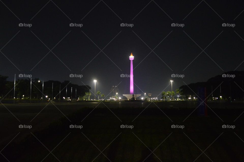 Purple color on the National Monument (Monas) , Jakarta, at night