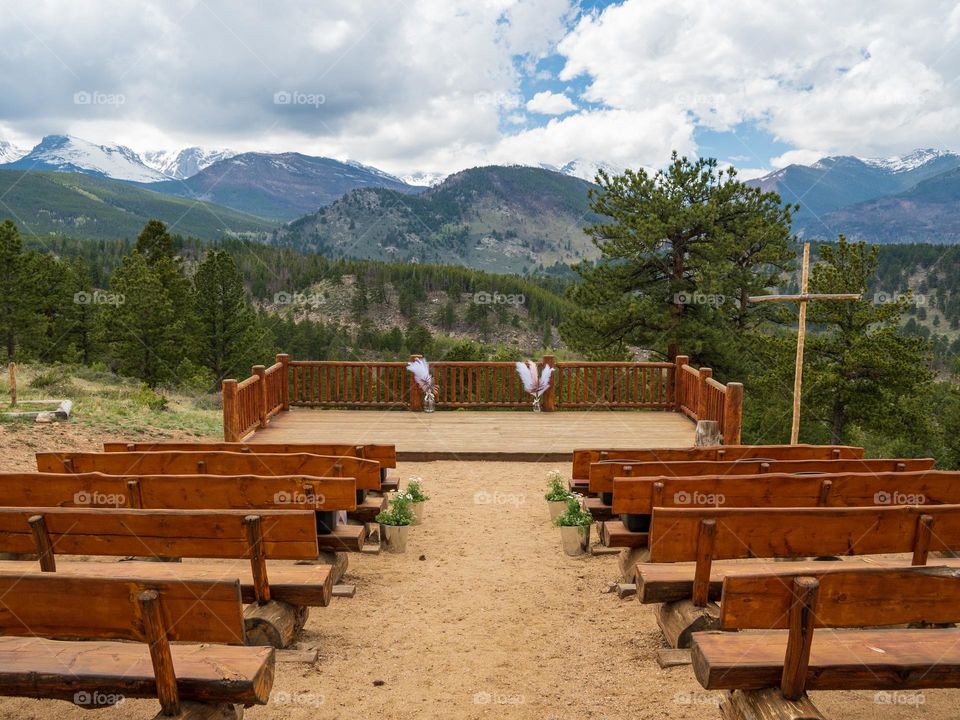 A outdoor wedding chapel with a gorgeous mountain view
