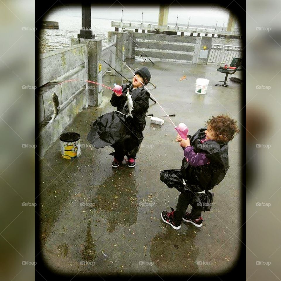 Rain or not,  they got their first catch.
