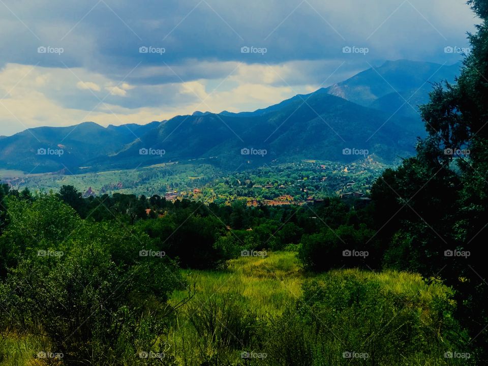 View from one of the hiking trails at garden of the gods in Colorado Springs, Colorado on a summer afternoon. We were watching the storm clouds roll in.