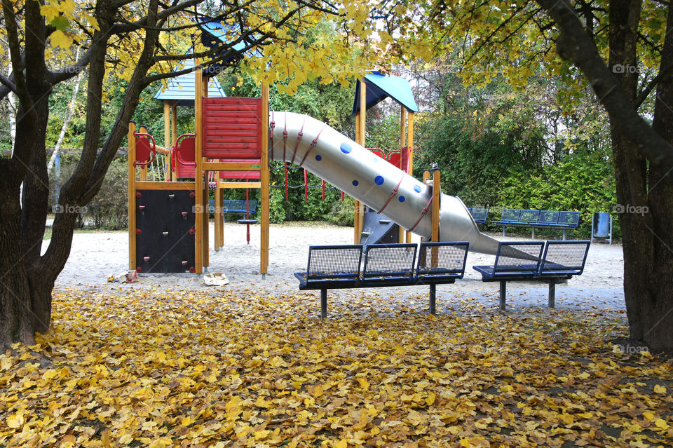 playground in autumn leave fun for children kid