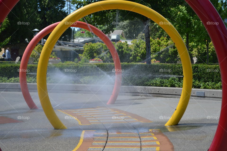 Colourful water spray play park