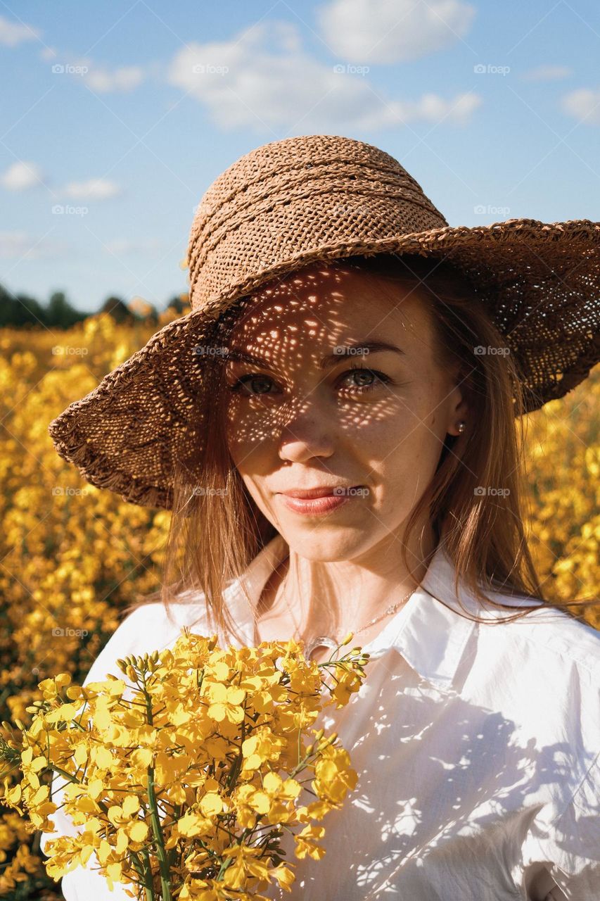 A girl in a straw hat