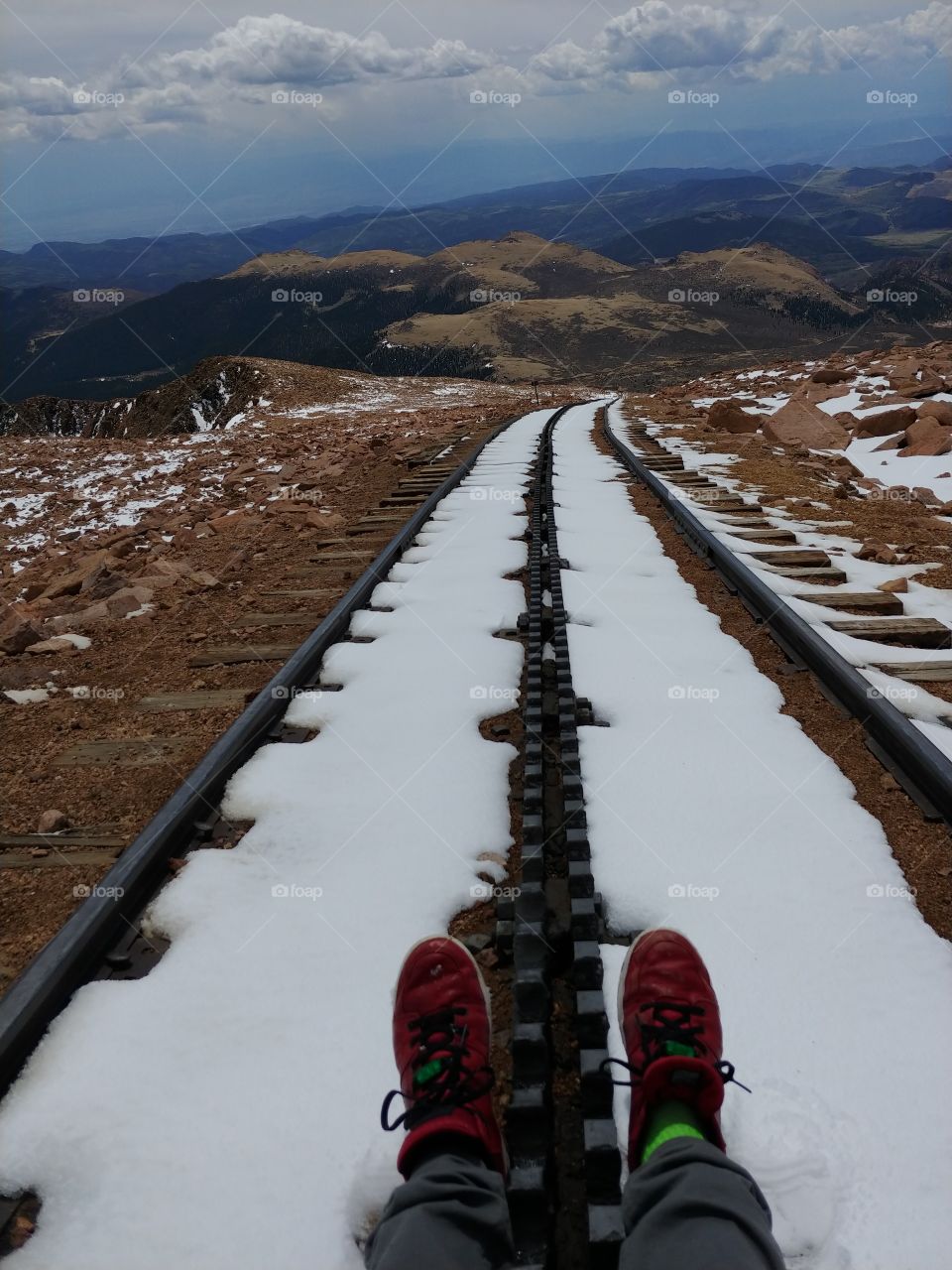 On the train tracks, in Colorado, on a high mountain top.