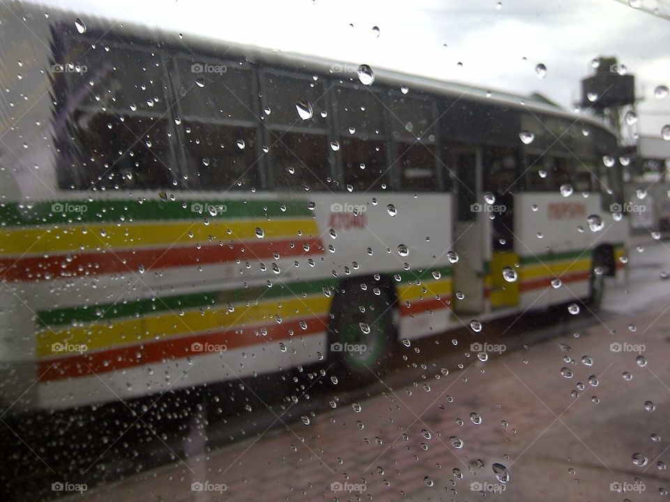 Bus view from outside while raining