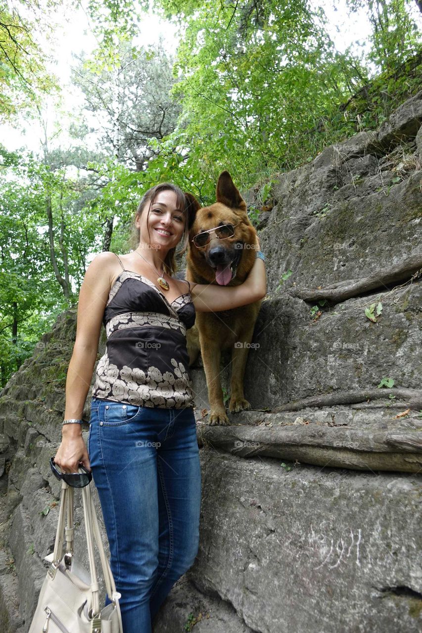 Low angle view of woman with dog