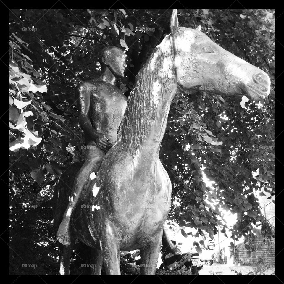 Horse and rider sculpture