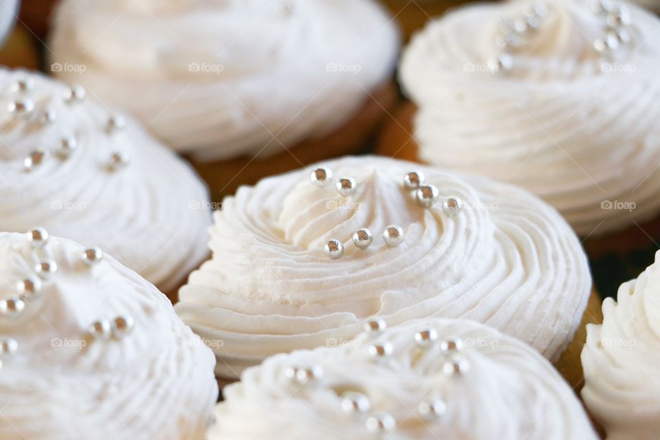 White frosted cupcakes