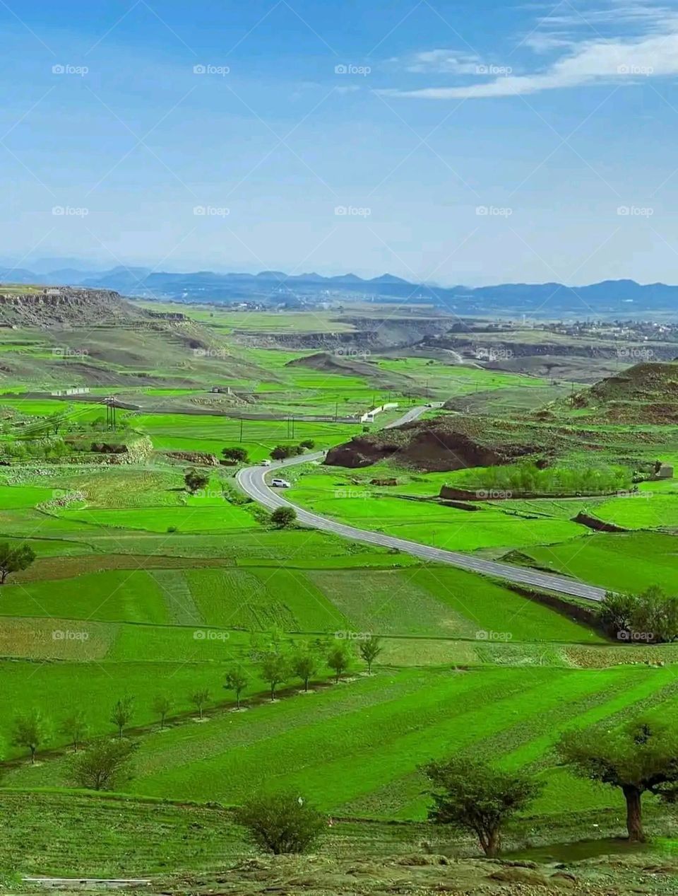 Glory be to God, the magnificent and picturesque view and the natural green trees are a view that is nothing more wonderful than it