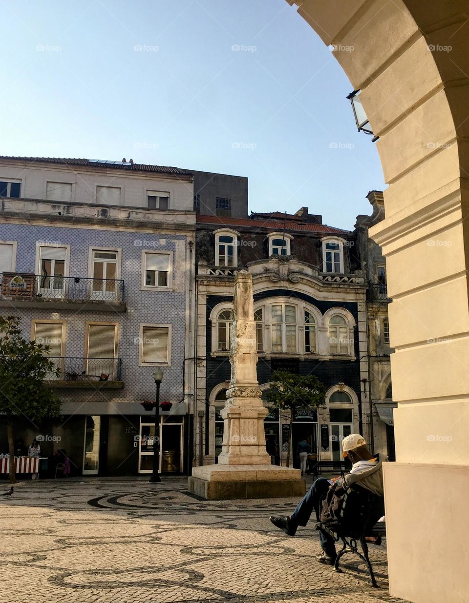 Man sitting in a Portugal city