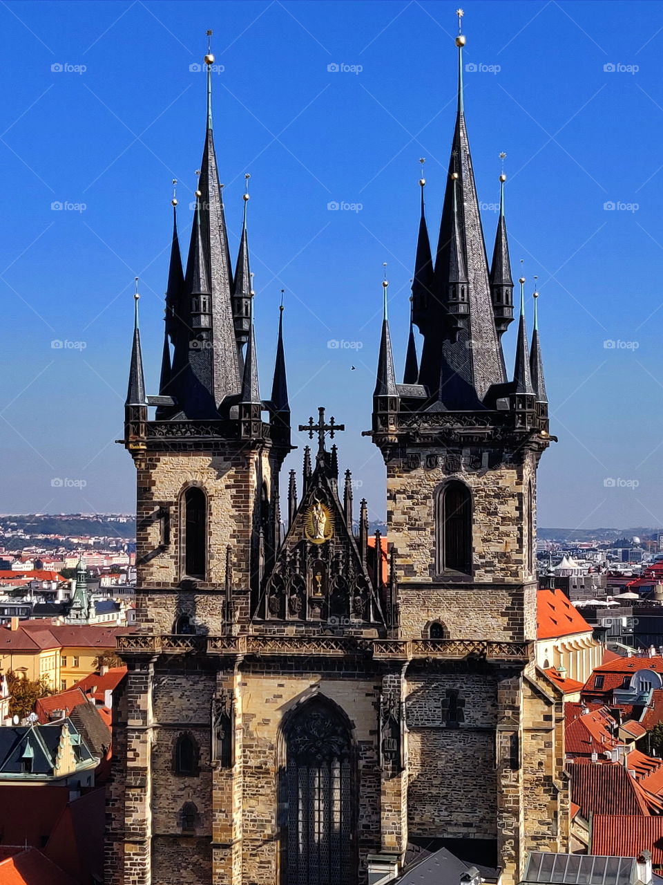 The temple from the tower with spiers in the old town of Prague