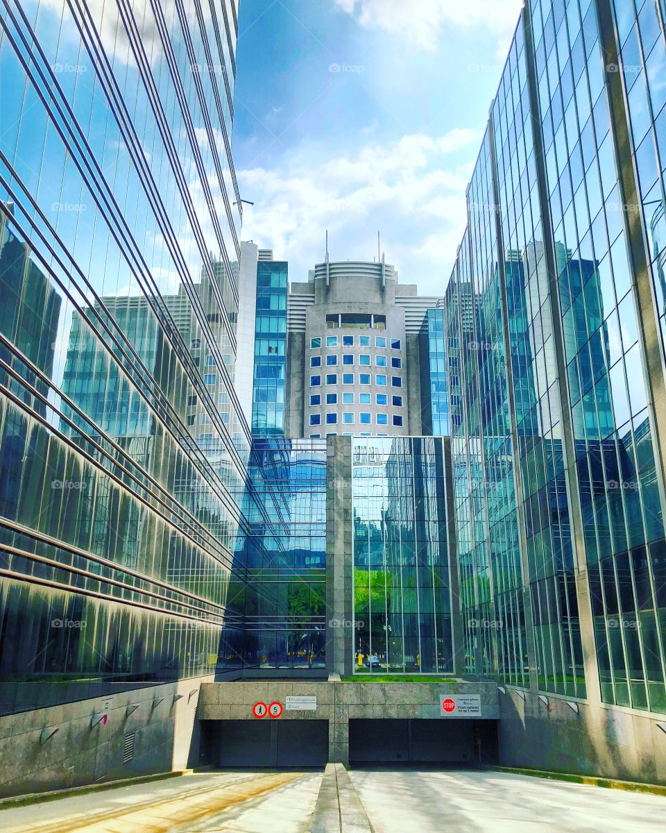 Reflected office buildings in the financial district of the city