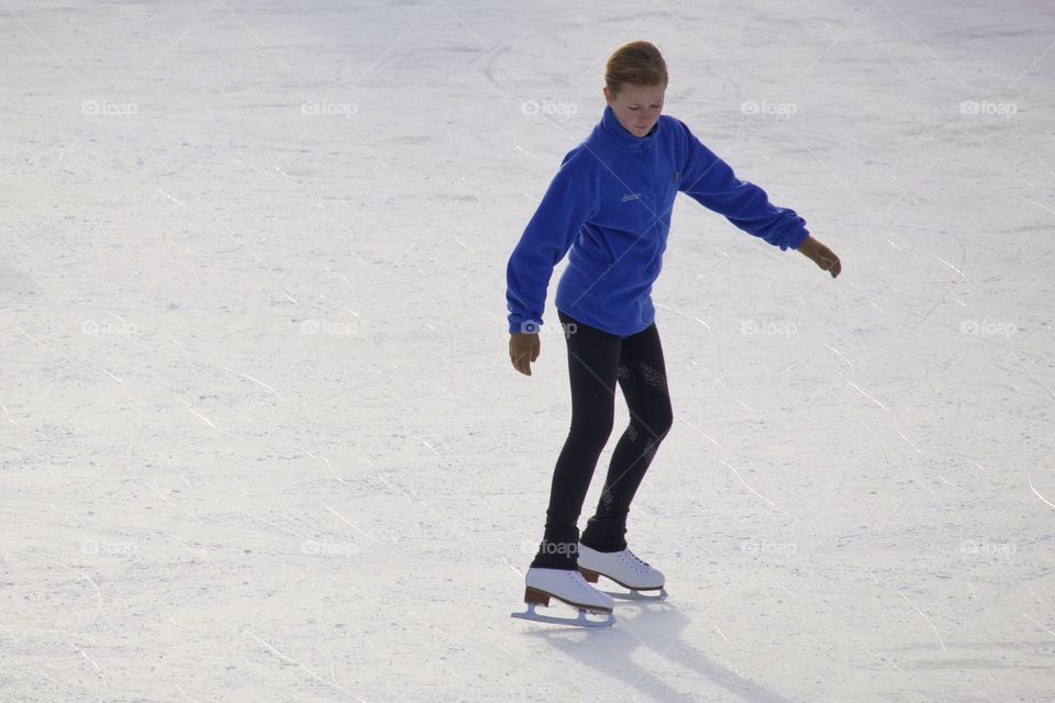 Woman on ice rink