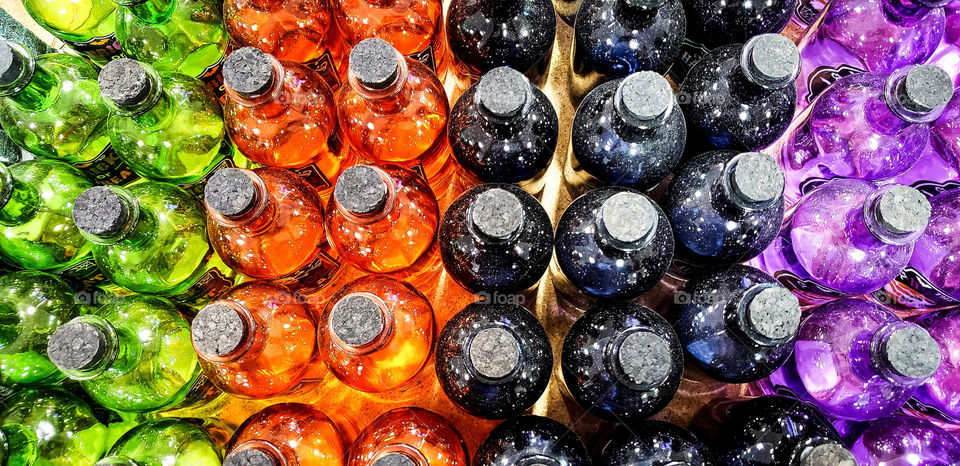 Colorful bottles lined up.