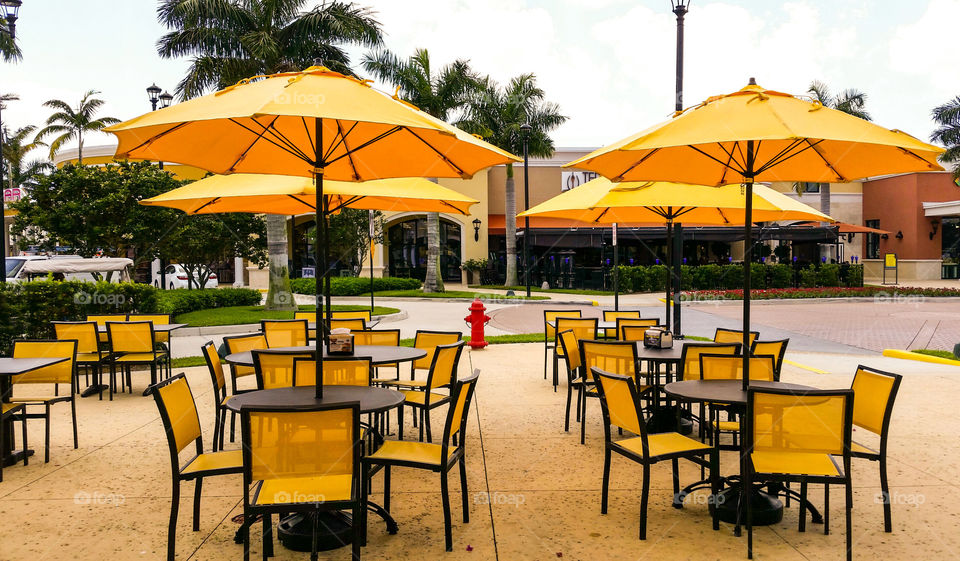 Yellow umbrellas and chairs