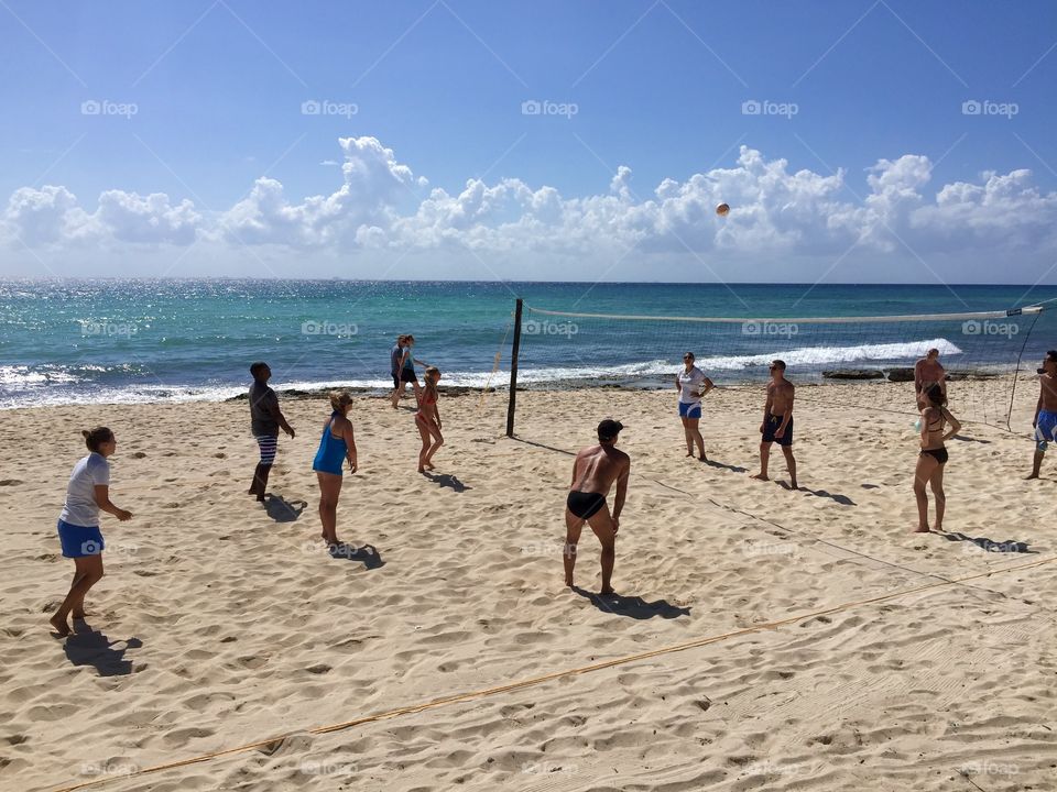 Beach Volleyball. People playing Volleyball on the beach, Riviera Maya, Mexico