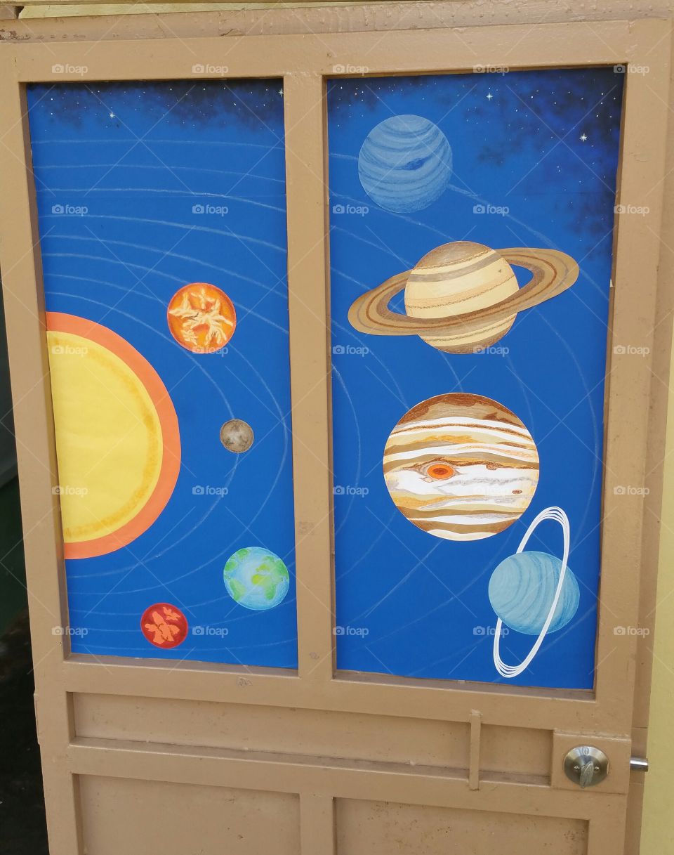 Solar system on science classroom door