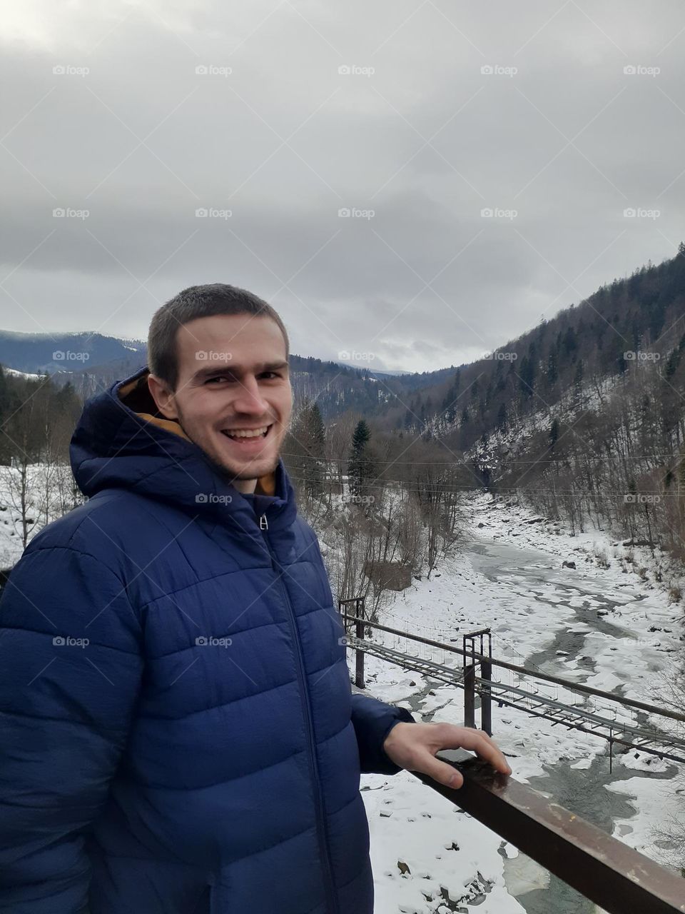 Portrait of a happy man in the Carpathians
