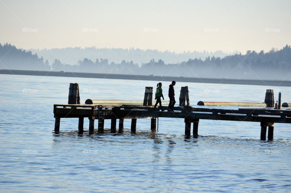 couple walking on the boardwalk