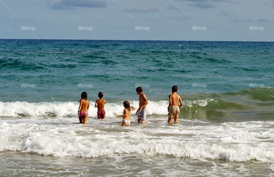 Cousins first day at the seaside 