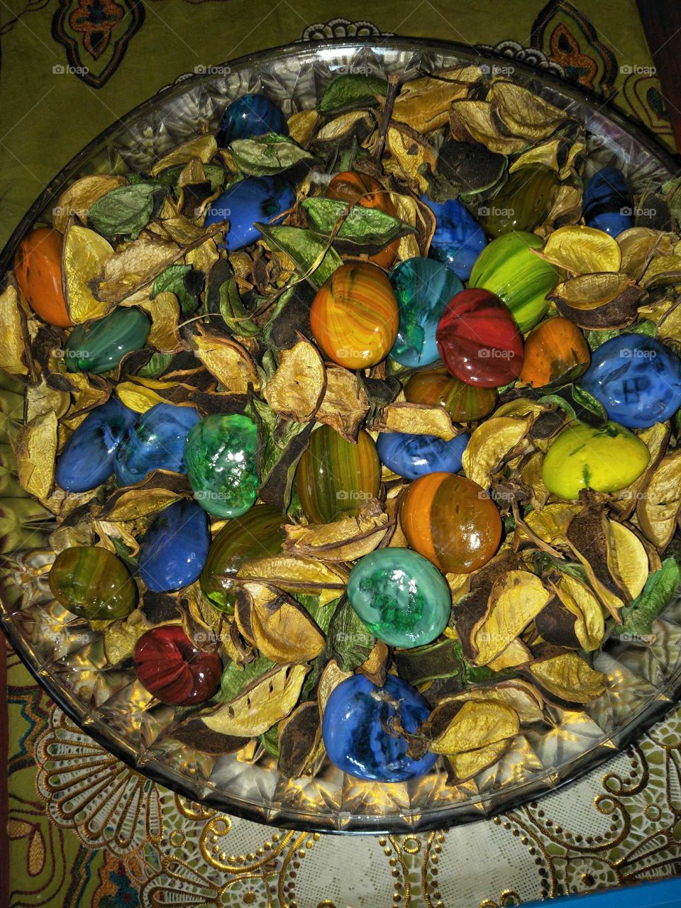 marbles and dried flowers